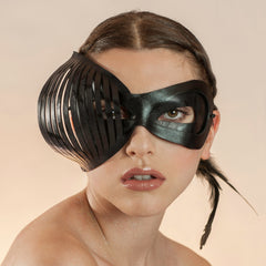 New York maskmaker Wendy Drolma. Gallery for uncompromising masks and headdresses.
