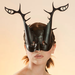 New York maskmaker Wendy Drolma. Gallery for uncompromising masks and headdresses.